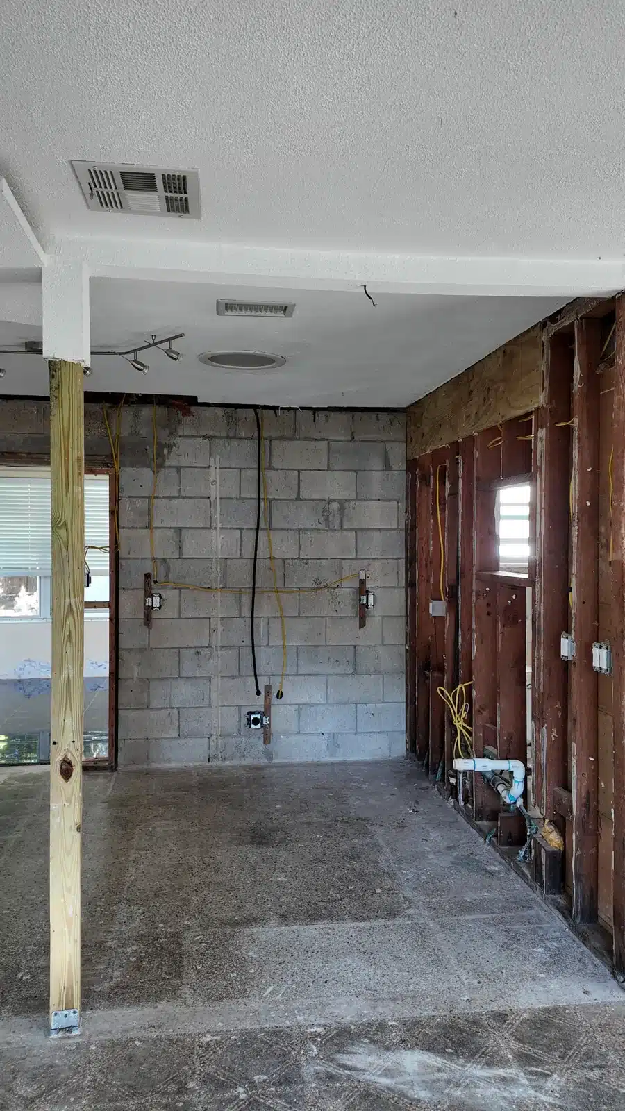 New Port Richey home stripped back to concrete block and timber framing before the renovation